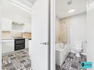 Rear Porch/Bathroom/Kitchen- click for photo gallery
